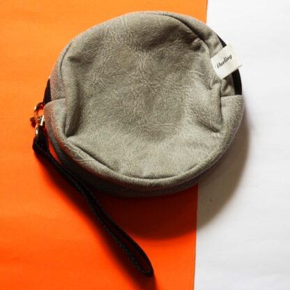 Neceser Circular Cuerina Gris